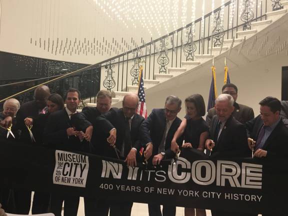 Museum of the City of New York administrators and elected officials at a Tuesday morning ribbon cutting of a permanent exhibit, &#8220;New York at its Core,&#8221; that will be open for 32 hours straight beginning Saturday morning. Photo: Madeleine Thompson