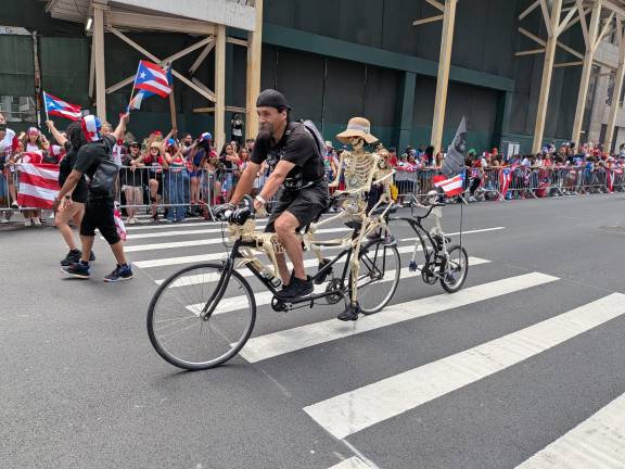 Puerto Rican Day Parade inlcuded a skeleton riding a PR flag-adorned bicycle.