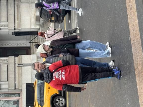 These tourists were approached by an illegal ticket seller outside the Bowling Green subway stop who tried to sell them tickets to a ferry that merely cruises past the Statue of Liberty.