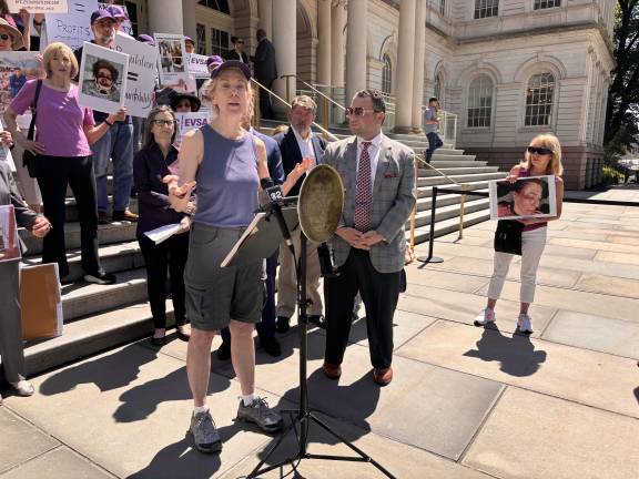 Wendy Peace, an e-bike crash victim and plaintiff in the lawsuit, recounts being struck head-on by a Citi Bike rider traveling the wrong way during the June 25 news conference.