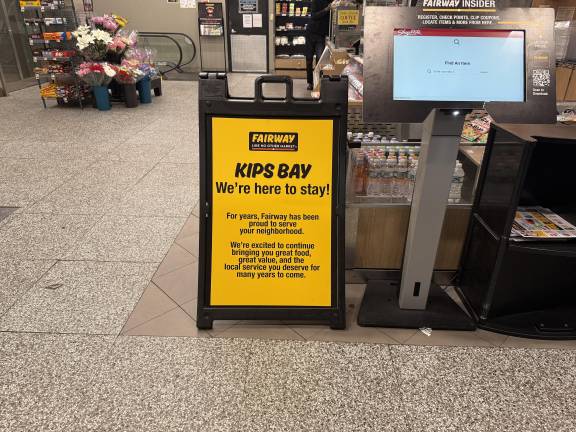 Inside the entrance of the Kips Bay Fairway Market, a sign expressed the grocer’s intent to stay for “many years to come.”
