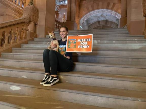 Lauren Claus and Penny in Albany lobby for a new law to hold pet owners responsible for injuries caused by their dogs.