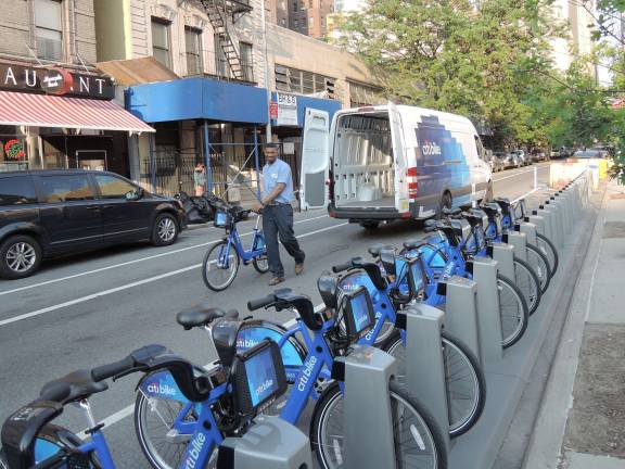 Citi Bikes being delivered to a West 54th Street station. Photo: Jim.henderson via Wikimedia