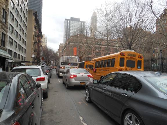East 67th Street, just west of First Avenue, where the Department of Transportation is proposing installing a crosstown bike lane. Photo: Susan Siskind