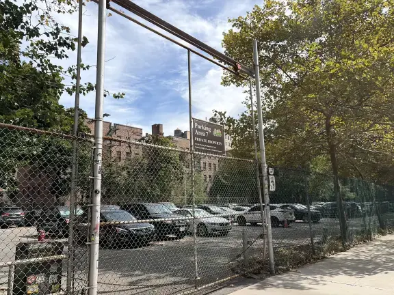 A resident at Village View has taken the East Village cooperative to court over the proposed sale of a parking lot of the premises, which has driven shared outrage among his fellow shareholders.