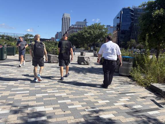 One NYPD officer patrols the park on foot around 10 a.m. on Aug. 25.