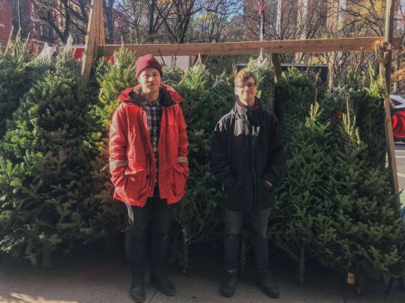 Brothers David Ljungvist (left) and Andre Blomqvist at their Christmas tree stand on Second Avenue and 88th Street. Photos: Olivia Kelley