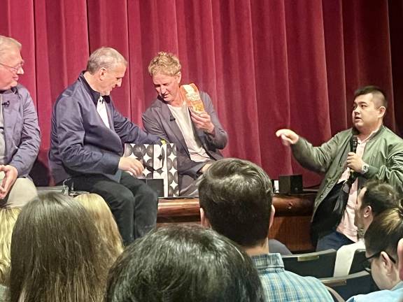 One of the Netflix Season 8 <i>Somebody Feed Phil</i> episodes is about Manila; one fan displayed his pleasure by presenting a bag full of Filipino snacks to the trio.