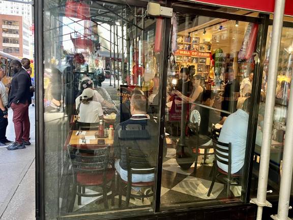 The Carnegie Deli reopened on Seventh Avenue on September 15, 2026, 10 years after it had closed. The Wall of Fame indoors is the same, but the location isn’t; it’s new address, 834 Seventh Avenue, was the former home of rival competitor Stage Deli, now gone.