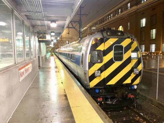 It’s a chilly winter’s eve in New Haven; former Amtrak Metroliner cab car 9651, one of 15 out of the original fleet of 61, waits for a return to Springfield, Mass., for the engineer to run the diesel and two cars from the front window. The Budd Company, not building railroad equipment any more, built trains to last—this unit started service in 1969.