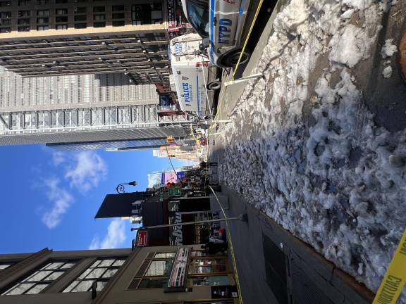 Police vans were still present outside the scene at around 2 p.m. on the day of the shooting.