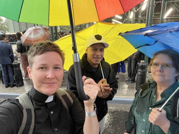 The Rev. Lea Matthews (left) and volunteer on accompaniment to ICE check-in. Photo: Courtesy St. Paul &amp; St. Andrew
