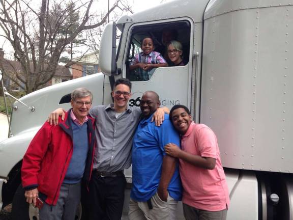 Sander Hicks, second from left, with potential constituents. Photo courtesy of Michael Pastko 