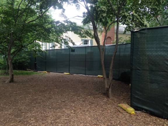 The staging area and construction yard for a renovation project at Gracie Mansion, which will keep a pedestrian path to the Carl Schurz Park promenade closed until about November.