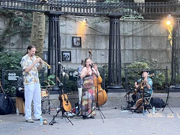 A jam band at the event played numbers such as Louis Armstrong’s “What A Wonderful World.”