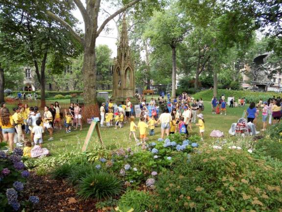 Though campers usually all gathered together before, as seen here, groups will be smaller and more spread out this summer. Photo courtesy of the Cathedral of St. John the Divine Archives