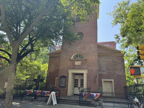 The historic Church of St. Luke in the Fields on Hudson Street is 204 years old and has long been active in Greenwich Village social causes. Its plan to rebuild its Mission Building after a fire is stirring a local controversy.