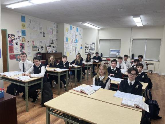 St. George educates Ukrainian students alongside Americans of various backgrounds. Here, a group of freshmen sit in math class. Photo: Kay Bontempo.