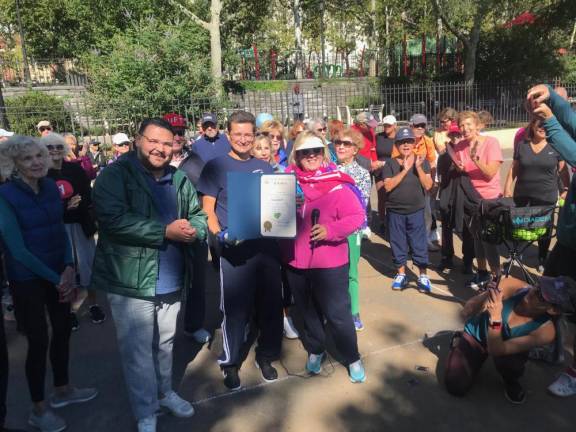 Center, left to right: Manhattan Parks Commissioner Anthony Perez, Pickleball instructor Albert and Assembly Member Seawright. Photo courtesy of Rebecca Seawright’s office