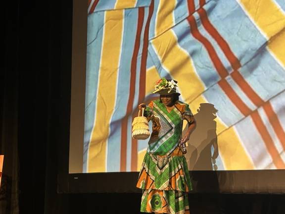 A model walks the runway in an outfit for city threads.