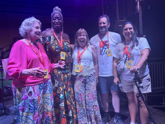 Lezlie Harrison (second from left), a jazz vocalist and co-founder of the Jazz Gallery, takes to the stage with the Jazz Gallery board during the first ever NoMad Jazz Festival in Madison Square Park. They plan to turn it into an annual event.