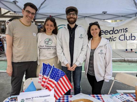76TH AD District Leaders at Four Freedoms Democratic Club’s booth at the recent 2nd Avenue Street fair surrounding the hat-wearing Ben Akselrod (M), Rebecca Weintraub (F), (far right), Kim Moscaritolo (F), Gabe Panek (M). P.S. Photo gender IDs were optional.] Photo: Four Freedoms Democratic Club