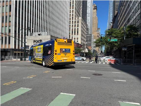Cross town buses were still being turned as the street in front of the damaged building at 235 E. 42nd St. remained closed to traffic on July 8, a day after steel beams buckled causing several floors to collapse in the former Pfizer HQ in the midst of a massive conversion project.