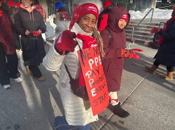 This nurse on the picket line outside Mount Sinai Wesst said she was campaigning for PPE: pay, protection of health benefits and enough staff to keep nurses and patients safe.