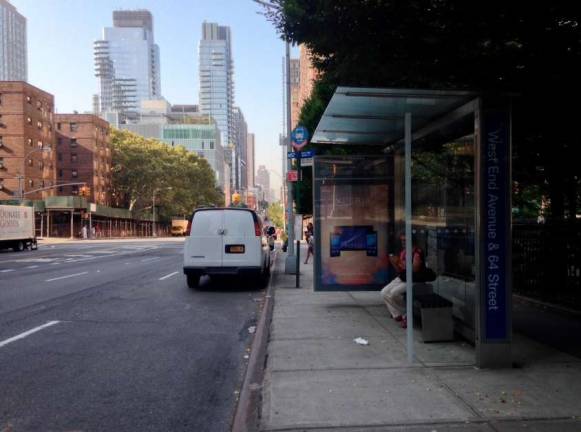 A proposal to install bus shelters on Fifth Avenue along Central Park, such as this one on West End Avenue, has garnered praise and criticism. Photo: Richard Khavkine