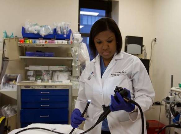 Dr. Pascale M. White with colonoscope. Photo courtesy of Mount Sinai Department of Medicine