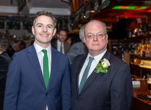 <b>Deputy Consul General of Ireland of Andrew Bryne (left) with acting Supreme Court Justice Jim Clynes who was honored at the Brehon Law Society gathering celebrating St. Patrick’s Day. </b>Photo: David Finlay