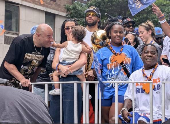The Brunson family, including baby Jordyn booping grandpa Rick on the nose, at Knicks’ ticker-tape parade. Tracy Morgan seated at right.