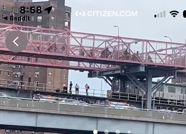 First responders on the Manhattan side of the Williamsburg Bridge on May 22, after two teens were injured while subway surfing. Fourteen year old Akhi Butler died as a result of his injuries while an 18 year old is in critical condition.