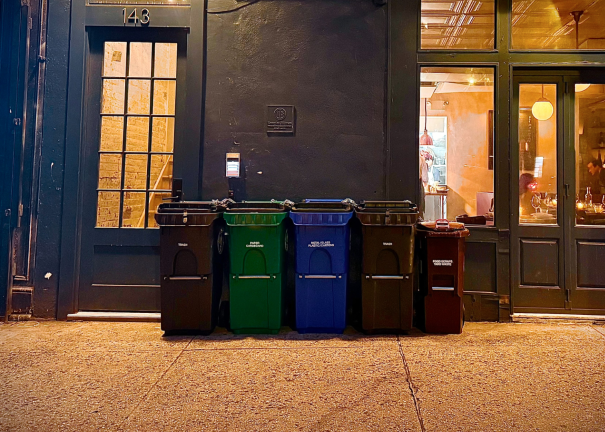 Starting April 1, fines will be levied against property owners that fail to compost food waste. The brown bin on the far right is for composting. The Sanitation Department plans to pick up compost once a week.