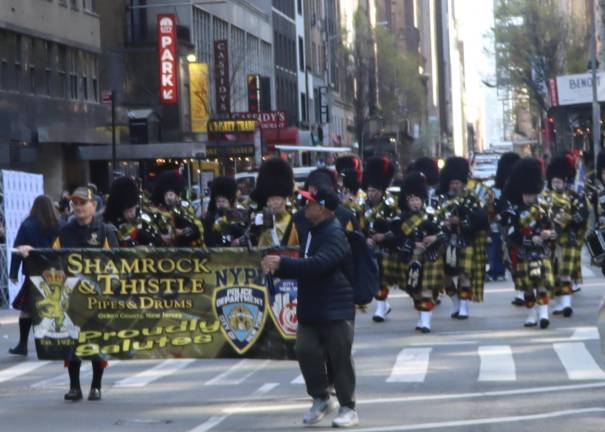 Tartan Day Parade including the Shamrock &amp; Thistle Pipes &amp; Drums.