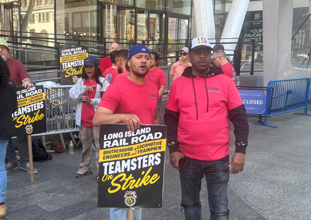 Striking Long Island Railroad workers outside Penn Station. Daryl (right) said he he is hoping for short strike for sake of both “our customers and rank and file workers.”