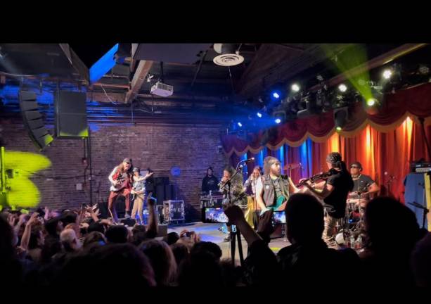 Gogol Bordello, the night’s headliner, caps three night stand with raucous New Year’s Eve that drew 1,200 revelers. From left, Eugene Hutz, Ashley Tobiaa, Gill Alexandre, Sergey Ryabtsev, Corey Kingston. Photo: Ben Gordon