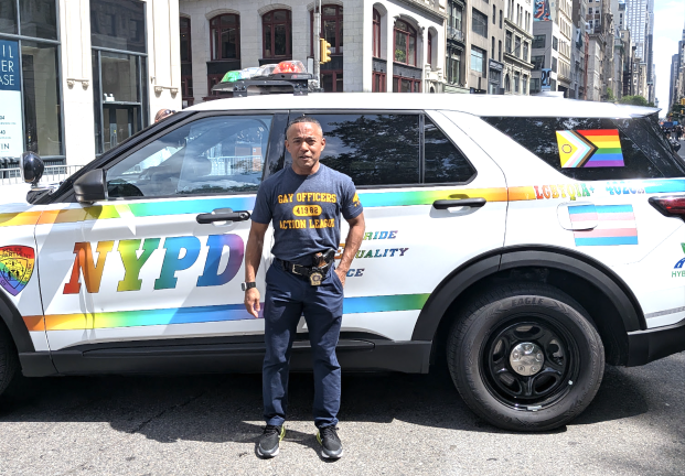 NYPD LGBTQIA+ themed RMP at and Gay Officers Action League cop at Pride March.