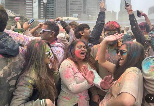Hi-five at the Holi Festival at the South Street Seaport March 7.