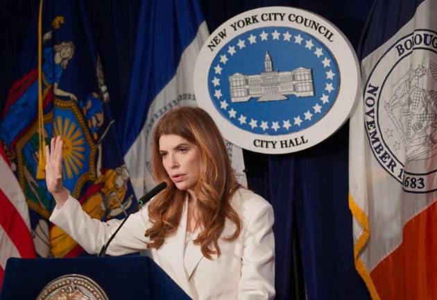 Julie Menin looks quite serious on Jan. 7 as she is officially sworn in as speaker of the City Council. She becomes the first Jewish speaker and the second woman to be elected to the post.