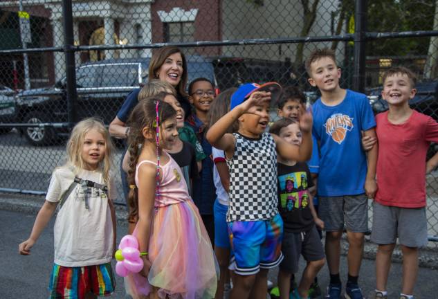 Governor Hochul spoke to and posed with children who attended the 13th Precinct’s National Night Out.