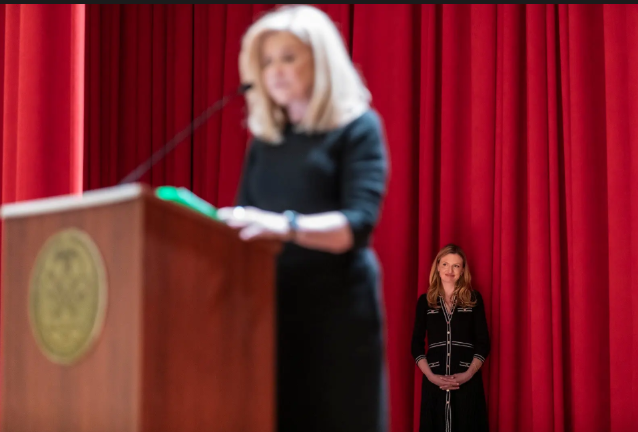Full Circle: Virginia Maloney (rear) looks on with admiration as her mother, who held an east side City Council seat for ten years before starting her 30 year run as a member of Congress, introduces her daughter who was elected to the seat once held by her mother on the City Council.