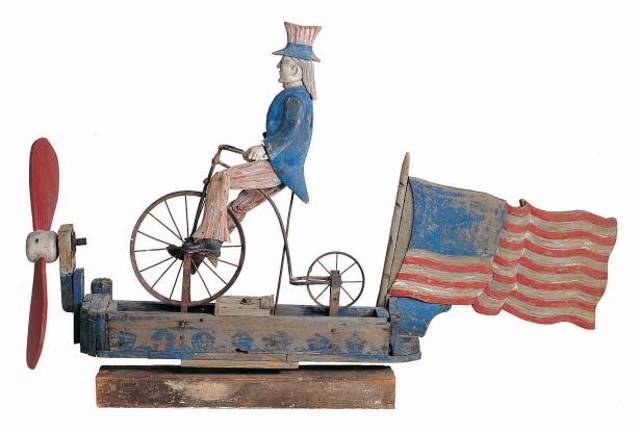 Uncle Sam Riding a Bicycle Whirligig, Probably New York State, 1880–1920, Paint on wood with metal, 37 x 55 1/2 x 11 in., Gift of Dorothea and Leo Rabkin.