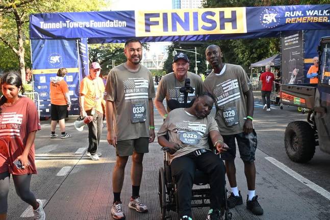 NYPD Detectives Endowment Association members at a T2T finish.