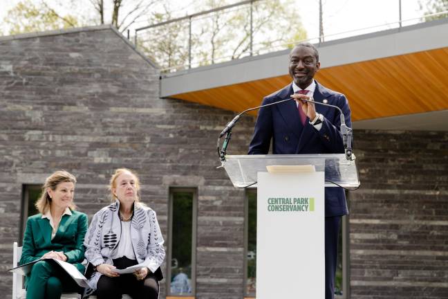 City Council Member Yusef Salaam (speaking), a member of the exonerated Central Park Five who now represents Harlem, said that the opening of the Davis Center represents a “healing” for his community. From left: Central Park Conservancy CEO Betsy Smith and City Council Member Gale Brewer.