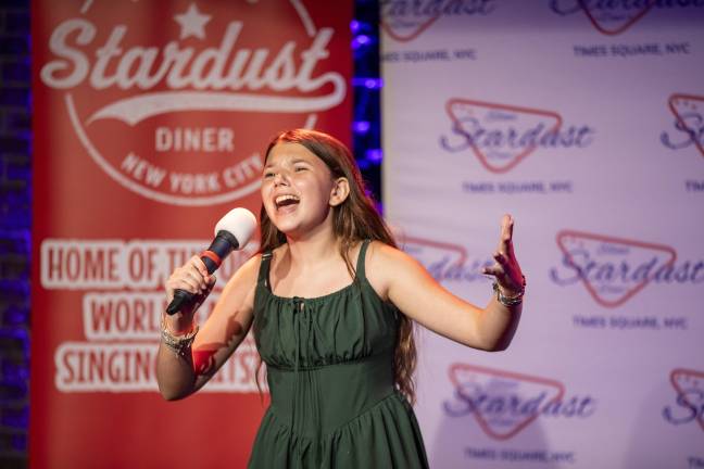 Julia Little performing “The Wizard And I” from “Wicked.” Judges commended her storytelling and vocal strengths.