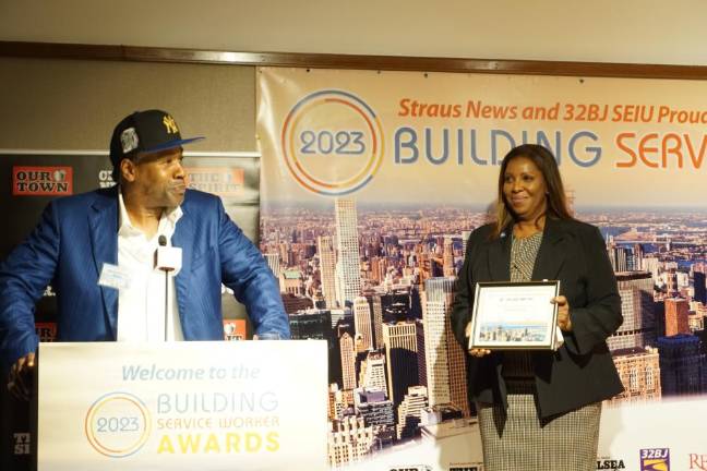 Window Cleaner of the Year Steven Purvey with NY State Attorney General Letitia James, who presented his award.