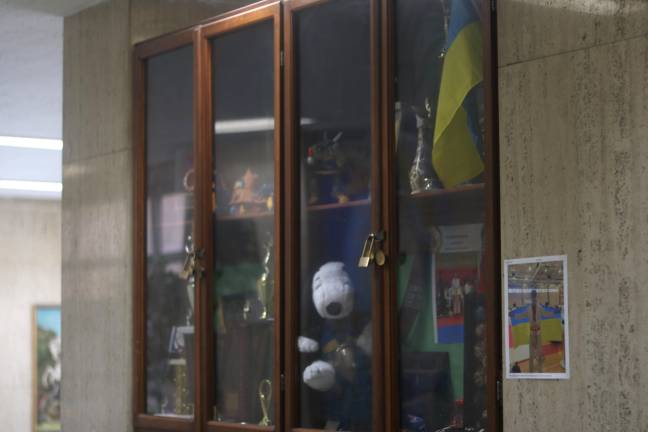 The Ukraine flag is seen throughout Saint George Academy’s cases and stairwells.