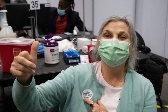 Post-vaccine thumbs-up at the Javits Center on January 13, 2021. Photo: Don Pollard/Office of Governor Andrew M. Cuomo