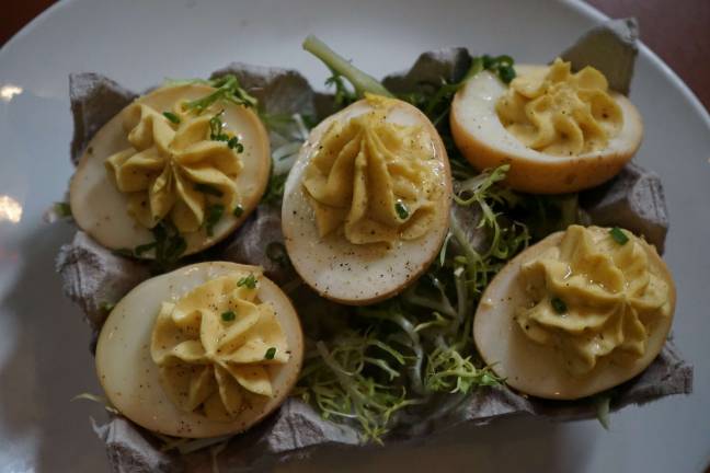 Smoke adds a surprising flavor to deviled eggs.